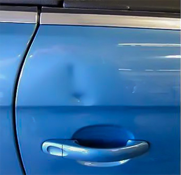 Blue door before paintless dent repair